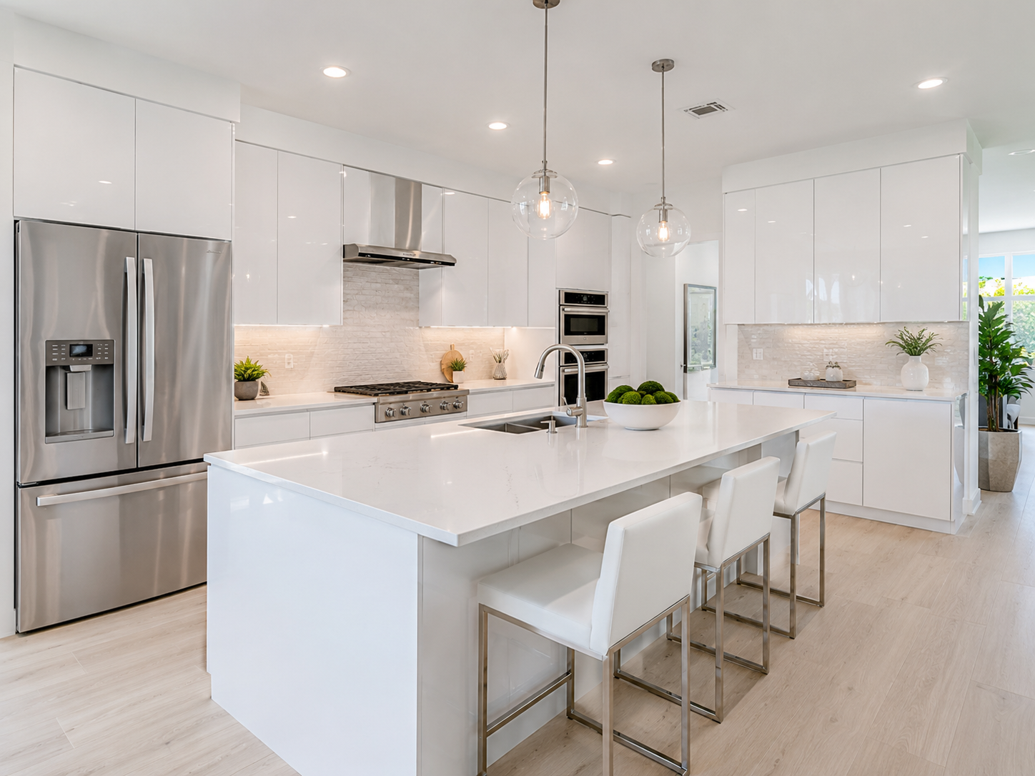 Modern kitchen interior with warm wood cabinetry and a large island